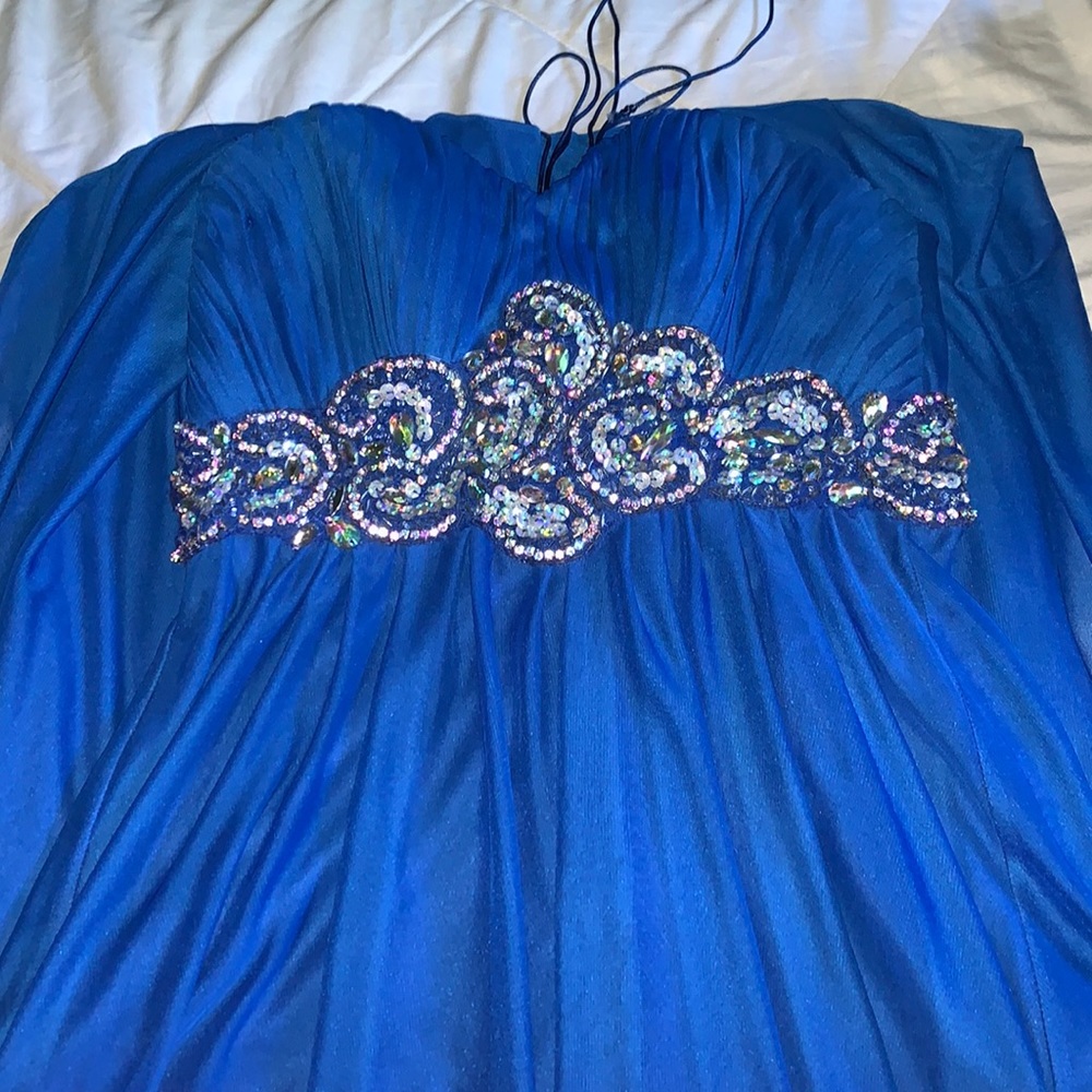 beautiful blue prom dress with lace up corset back